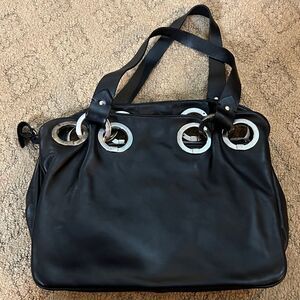 Chic Black Shoulder Bag with Silver Ring Accents